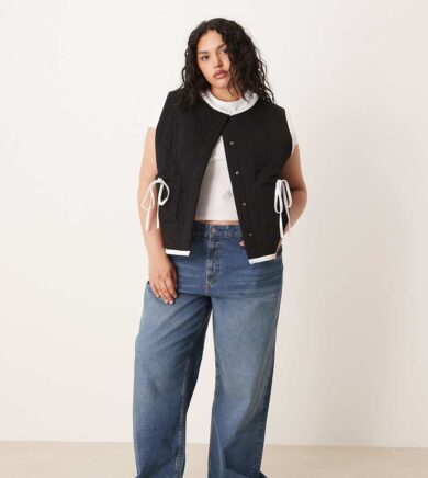 ASOS DESIGN Curve gilet with quilted contrast binding design and bow pocket detail in black